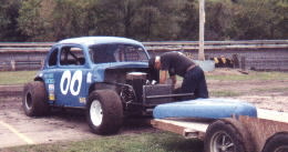 My dear old Dad, slaving over a hot racecar!